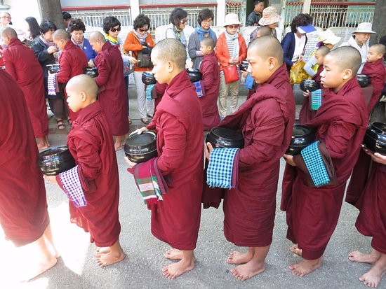 Alms giving ceremony in Myanmar